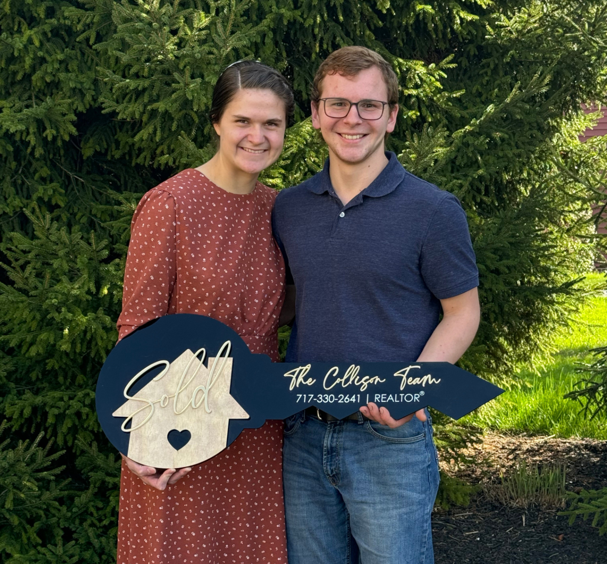 happy couple home sold