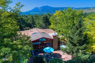 03-1430-Aerial_Front_Left_Flatirons_Med_3TMDE_RVT2-NR_E_HiRes1MB_Web