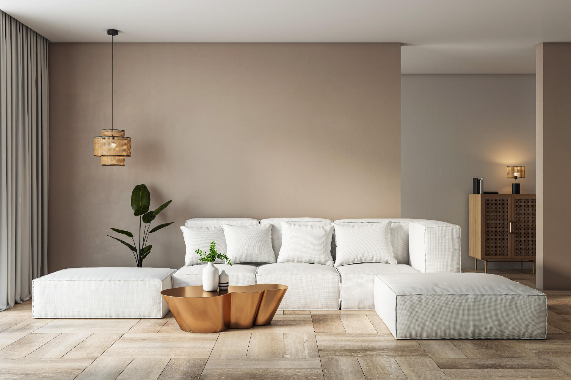 Contemporary living room with a white sofa, a golden coffee table