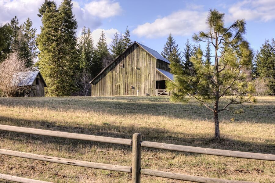 Rustic old barn on clear day in Hayden