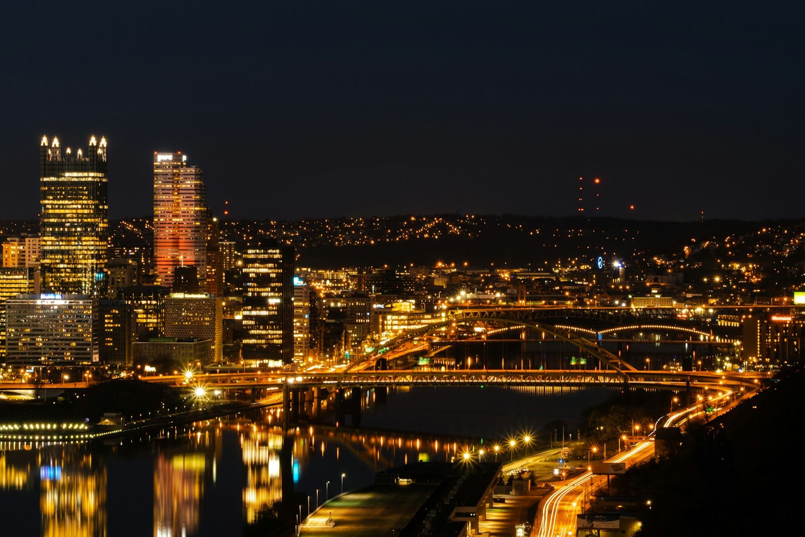 Pittsburgh skyline at night near Cranberry Township PA real estate