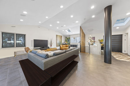 remove clutter_ knick knacks_ _ photos from shelves and furniture throughout the room-8