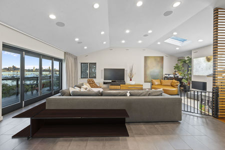 remove clutter_ knick knacks_ _ photos from shelves and furniture throughout the room