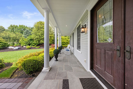 13 covered front porch with bluestone