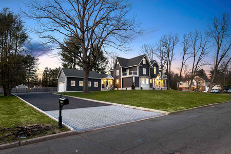 Twiliight Exterior of a gut renovation in River Vale NJ