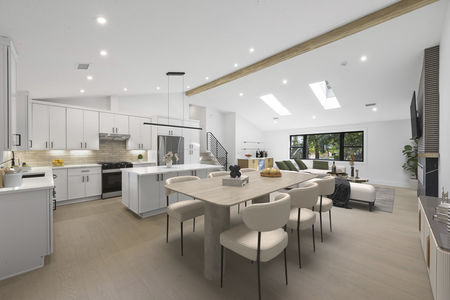 Dining Room and New Kitchen with vaulted ceiling and wide open in family room in renovated split level in ordall nj