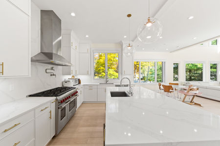 14 Quartz waterfall island kitchen