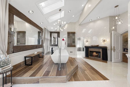 28 primary bathroom soaking tub and fireplace