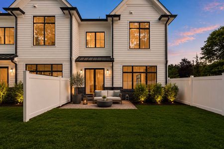 10 Cozy twilight backyard with modern home