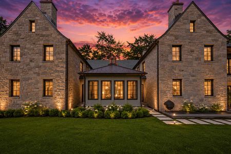 16. 548 Sylvan Pl Haworth Elegant stone estate at sunset.png