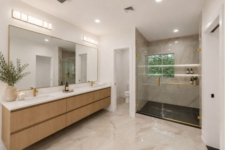 16 Modern luxury bathroom with gold accents