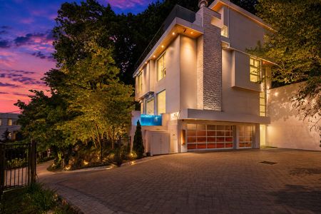 2-31 Casta Modern home at twilight glow