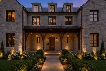 2 548 Sylvan Pl Elegant stone mansion at twilight
