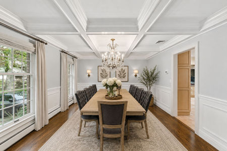 20. 18 Monument Elegant dining room with crystal chandelier