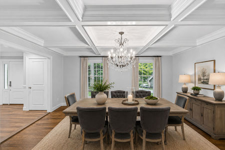 21. 18 Monument Elegant dining room with chandelier centerpiece