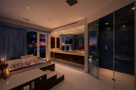 24-31 Casta Luxurious spa bathroom with sunset view