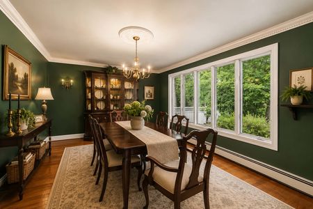 26. 135 Skyline Lakes Drive Traditional dining room with lush greenery