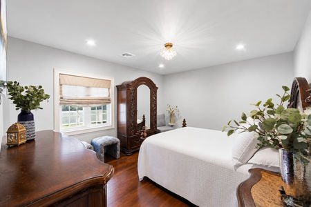 26 14 Morrow Midland Park Elegant bedroom with modern-traditional style