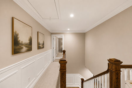 27. 18 Monument Soft hallway with framed landscapes