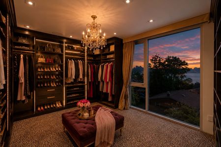 29- 31 Casta Luxurious walk-in closet with sunset view