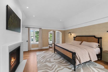 30 548 Sylvan Pl Modern luxury bedroom with fireplace