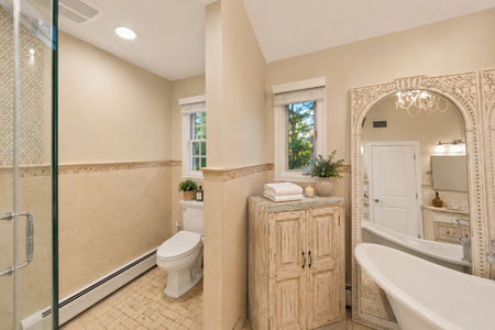 35. 18 Monument Elegant neutral-toned spa bathroom design