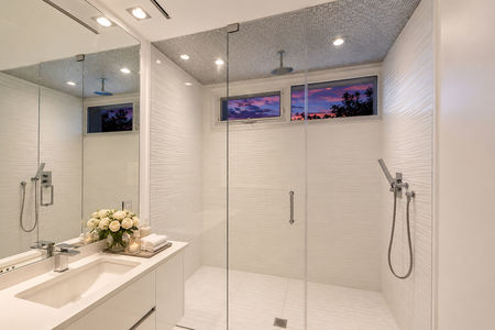 35-31 Casta Modern spa bathroom with twilight view