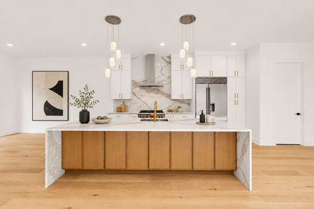 35 Modern minimalist kitchen with golden accents