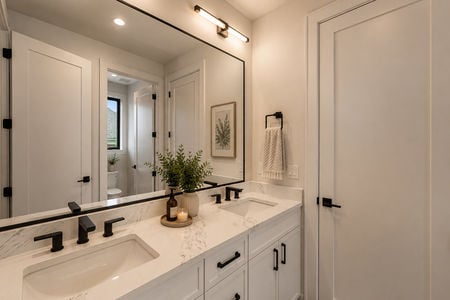 37. 401 Grand Ave. Modern minimalist bathroom with black accents