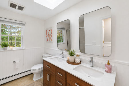 39. 18 Monument Bright minimalist bathroom with natural light