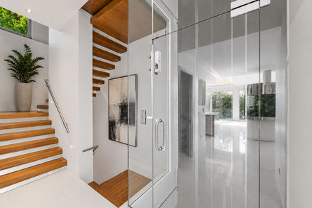 39-31 Casta Bright modern minimalist hallway with stairs
