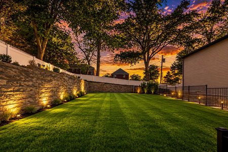 45. 401 Grand Ave. Serene sunset backyard landscape with trees
