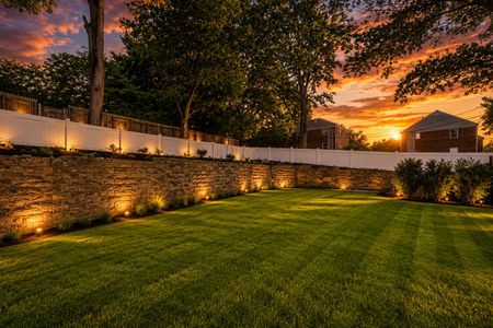 46. 401 Grand Ave. Golden hour in a manicured backyard