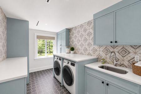46 548 Sylvan Pl Modern laundry room with natural light