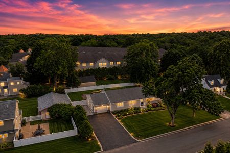 48 14 Morrow Midland Park Serene sunset over suburban neighborhood