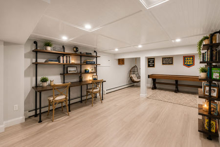48. 18 Monument Modern basement workspace and rec area