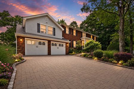5. 18 Monument Suburban home at twilight glow