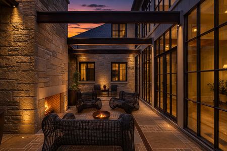 5 548 Sylvan Pl Twilight courtyard with fire features