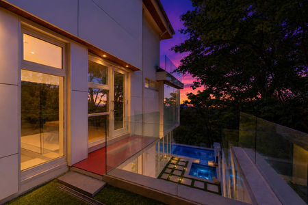 50-31 Casta Sunset over a modern terrace and pool