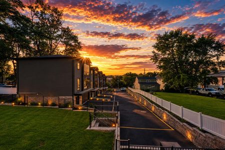 50. 401 Grand Ave. Sunset over modern suburban townhouses