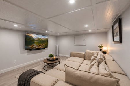 52. 18 Monument Modern cozy basement home theater lounge