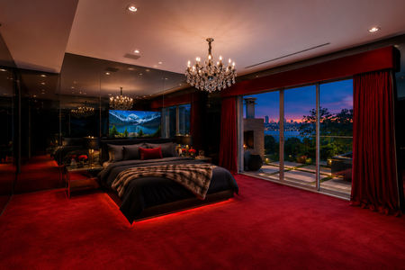 54-31 Casta Luxurious bedroom with city view at dusk