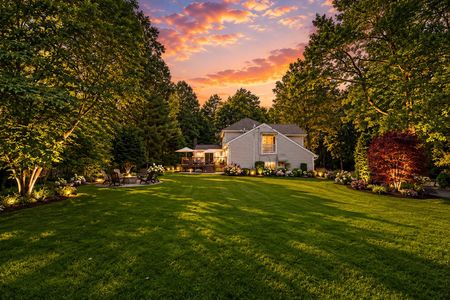 60. 18 Monument Cozy sunset over suburban backyard garden