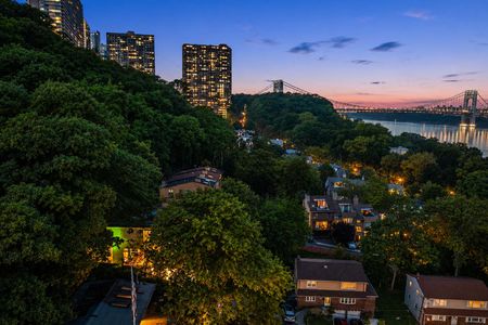 62-31 Casta Twilight over suburban hillside and bridge