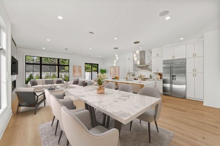 7 dining room in front_ living room to left and back_ breakfast nook toward the back
