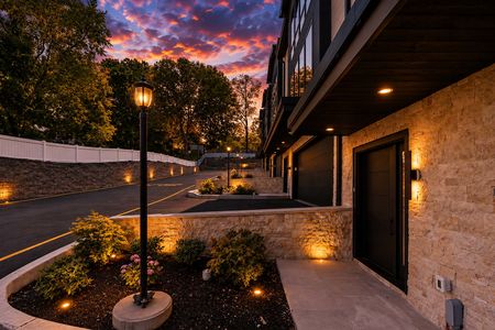 8. 401 Grand Ave. Sunset-lit modern townhome driveway