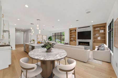 8 breakfast nook in front_ living room_ dining in background