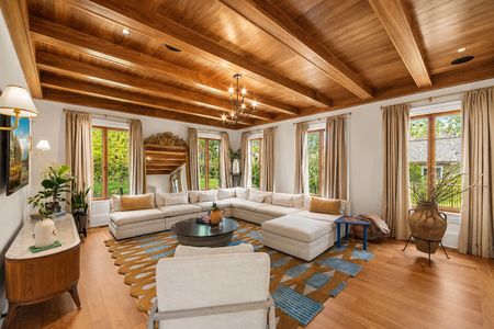 9 548 Sylvan Pl Elegant sunlit living room with greenery