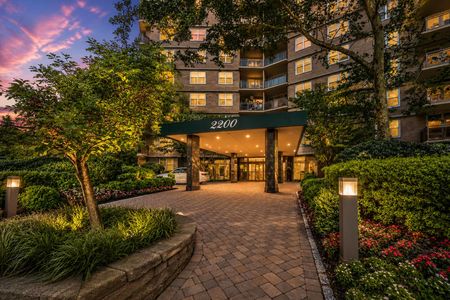 1. 2200 N Central Inviting dusk at a modern entrance