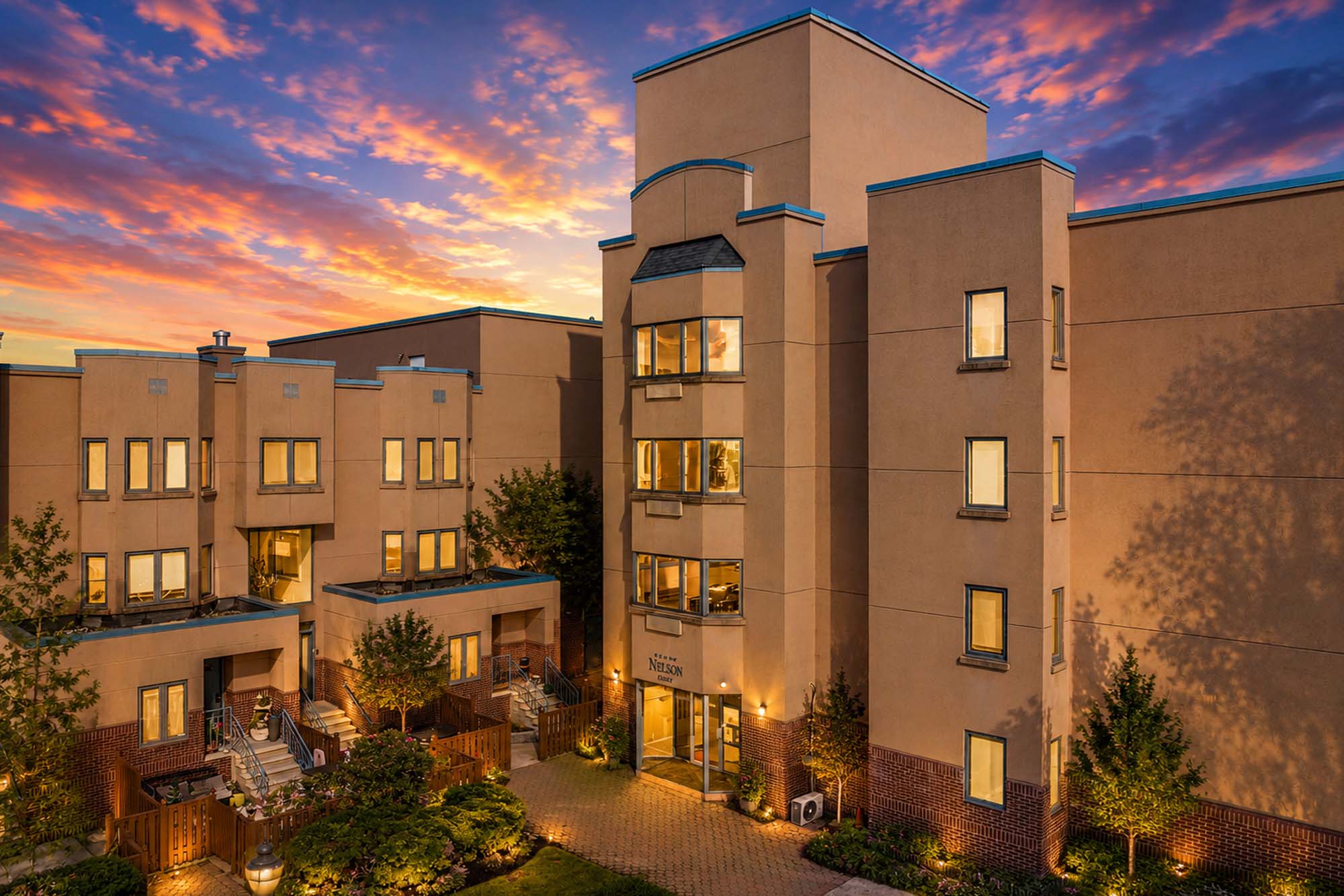 1. 303B Nelson Sunset over modern apartment courtyard